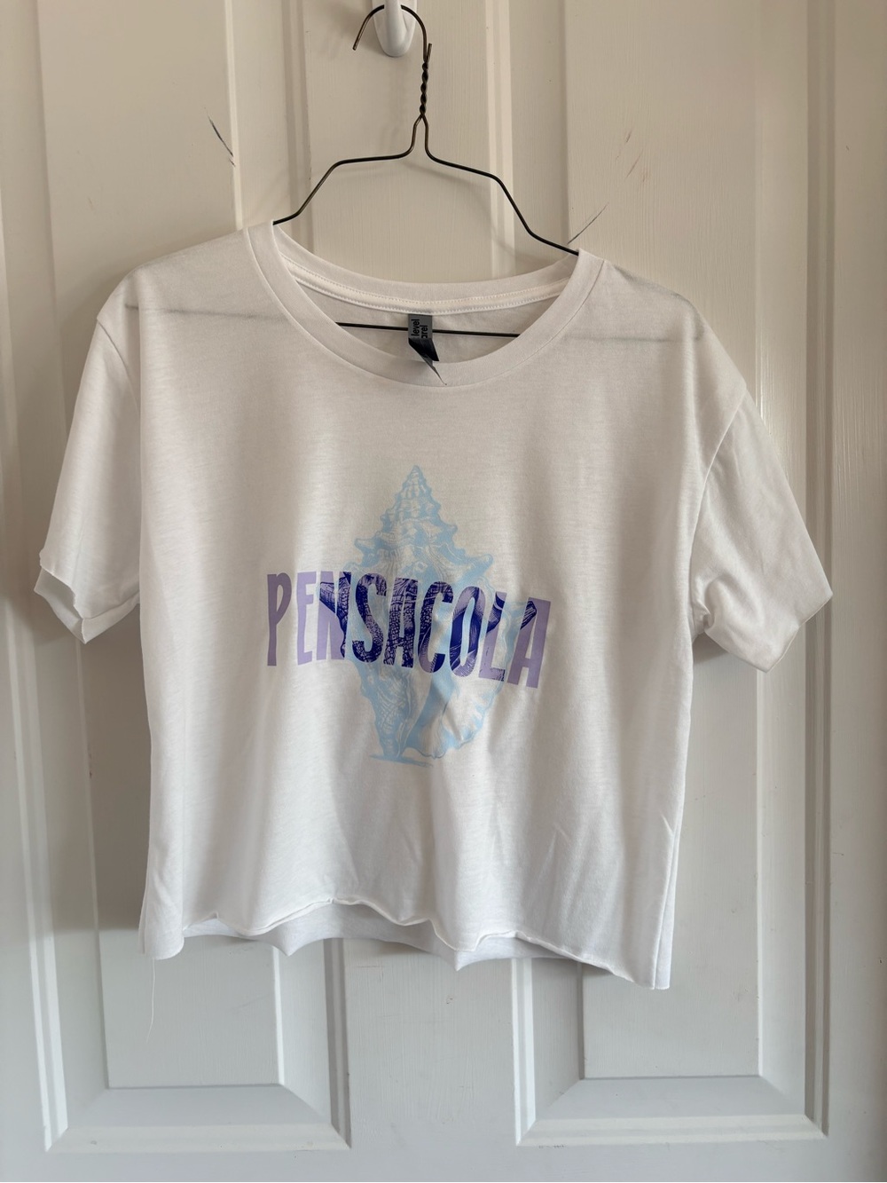 Pensacola conch shell Next Level Apparel White Crop Top